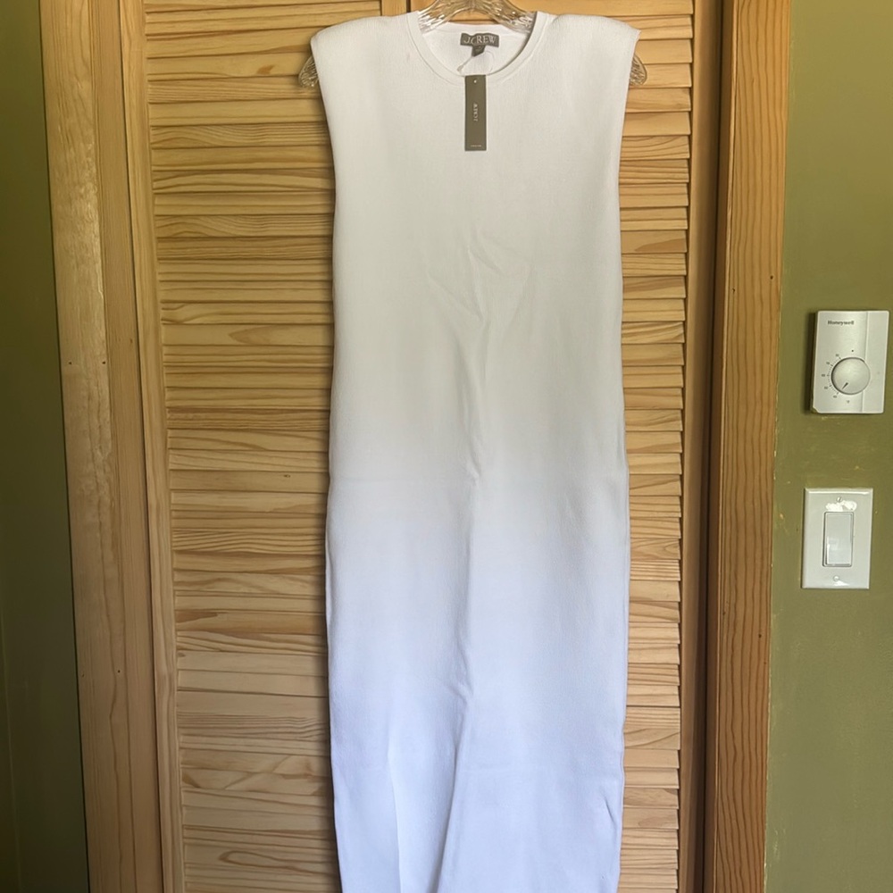 White front slit dress with shoulder pads